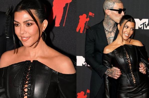 卡戴珊大姐在奥斯卡红毯与男友热吻 酥肩诱惑非常迷人